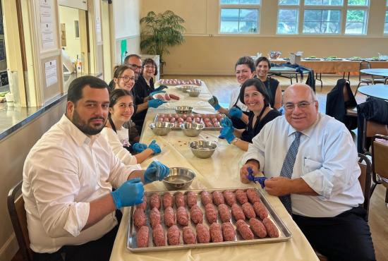 Parish volunteers prepare Armenian food for the St. John Food Festival.