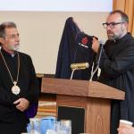 Fr. Mesrop Ash speaks during the celebratory reception for Archbishop Hovnan Derderian