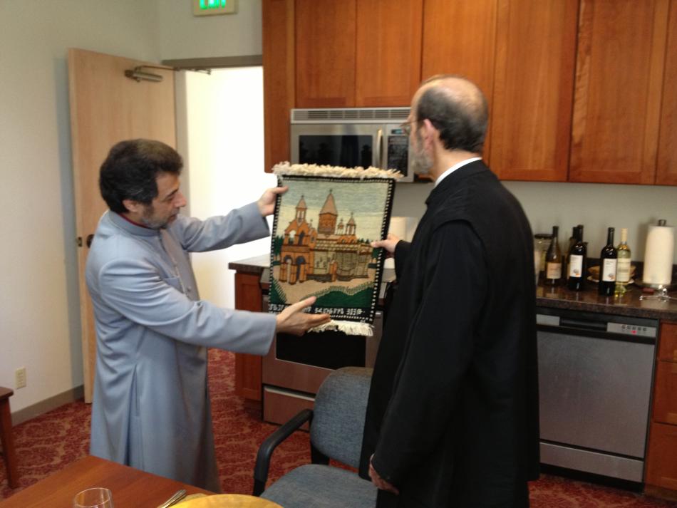 The Primate presents a gift to Metropolitan Gerasimos