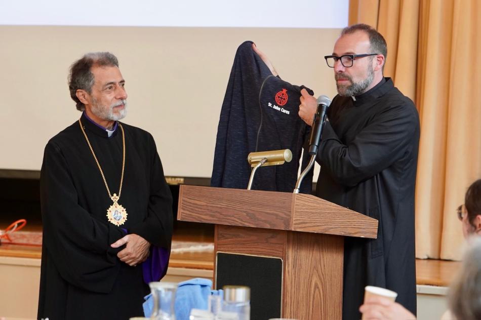 Fr. Mesrop Ash speaks during the celebratory reception for Archbishop Hovnan Derderian Fr. Mesrop Ash speaks during the celebratory reception for Archbishop Hovnan Derderian