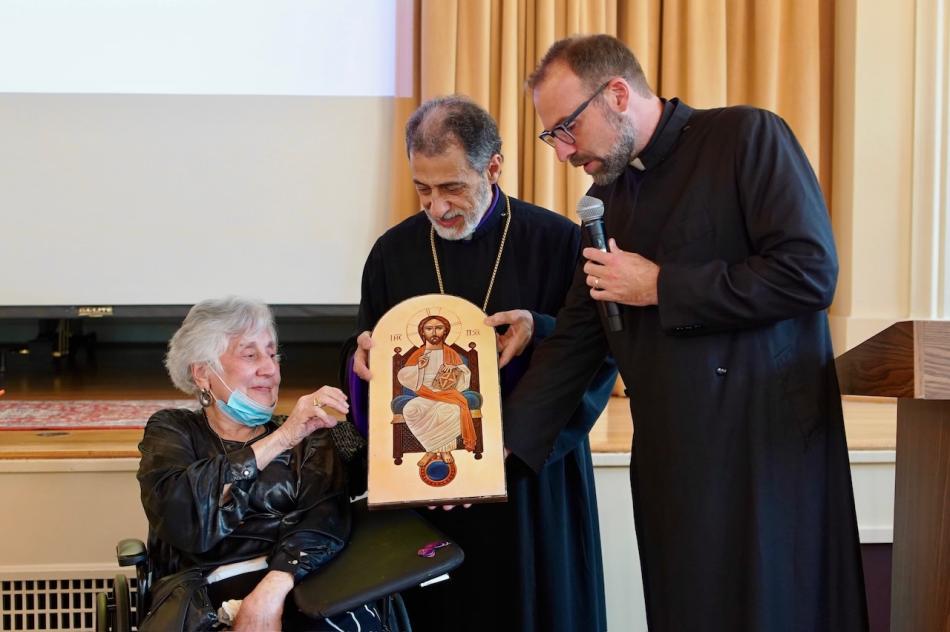 Yn. Betty Sempadian receives an icon of Jesus Christ from Archbishop Hovnan Derderian and Fr. Mesrop Ash Yn. Betty Sempadian receives an icon of Jesus Christ from Archbishop Hovnan Derderian and Fr. Mesrop Ash