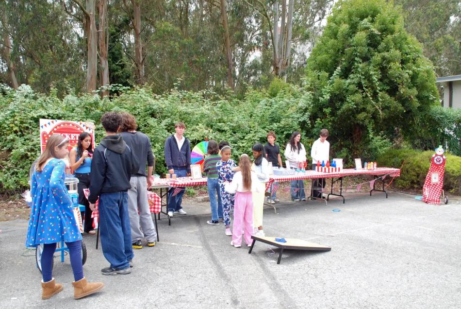 ACYO game booths support the Children of Armenia Fund at the parish picnic