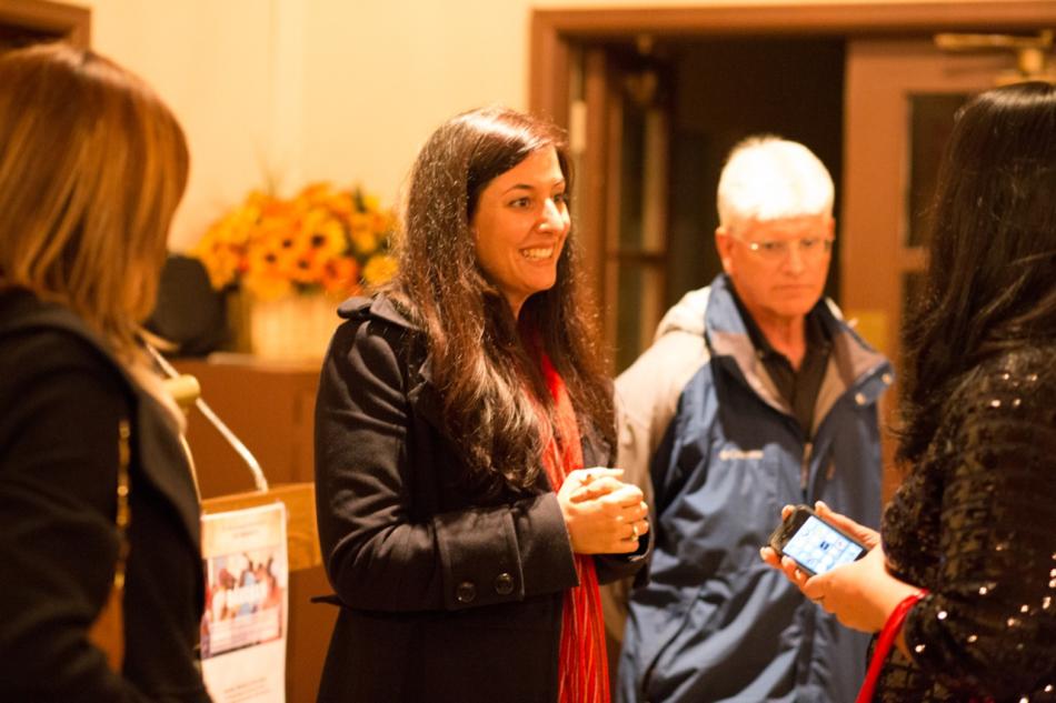 Director, Adrineh Gregorian talks with attendees after the screening