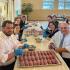 Parish volunteers prepare Armenian food for the St. John Food Festival.