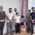 The Abgaryan family and supporters gather at the family’s new home in Etchmiadzin.