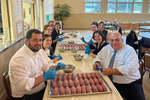 Parish volunteers prepare Armenian food for the St. John Food Festival.